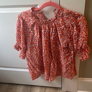 Red floral print blouse